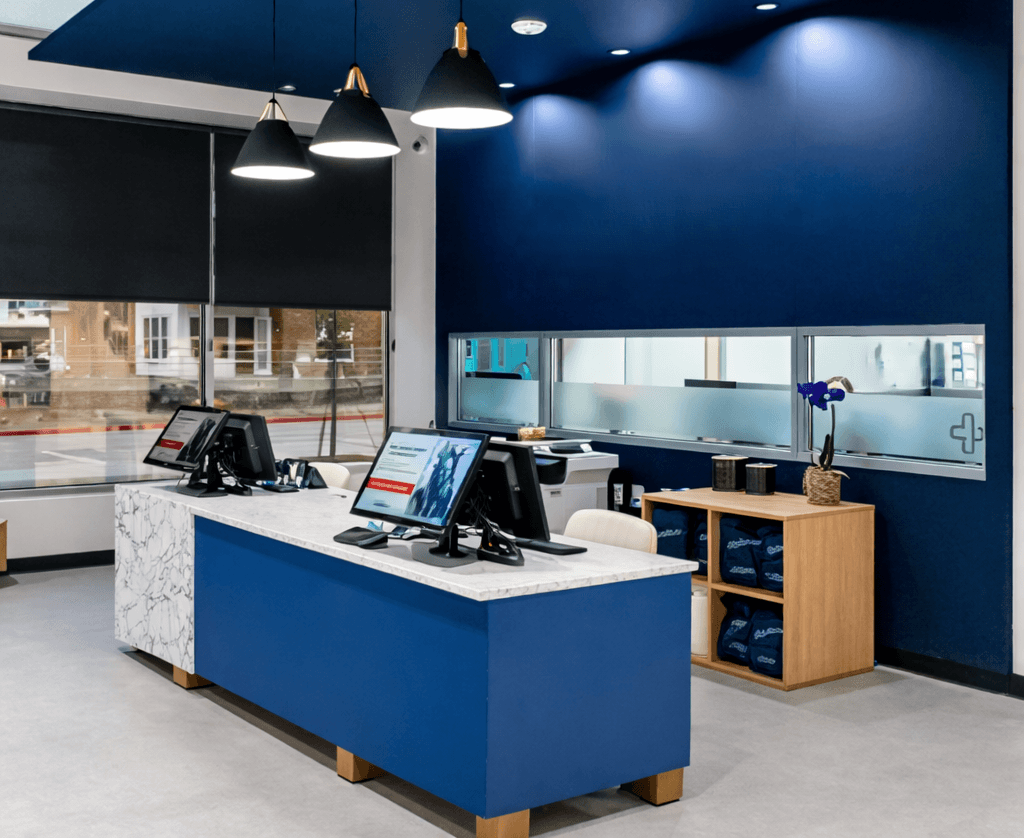 Medical office reception desk, waiting, and public circulation millwork.